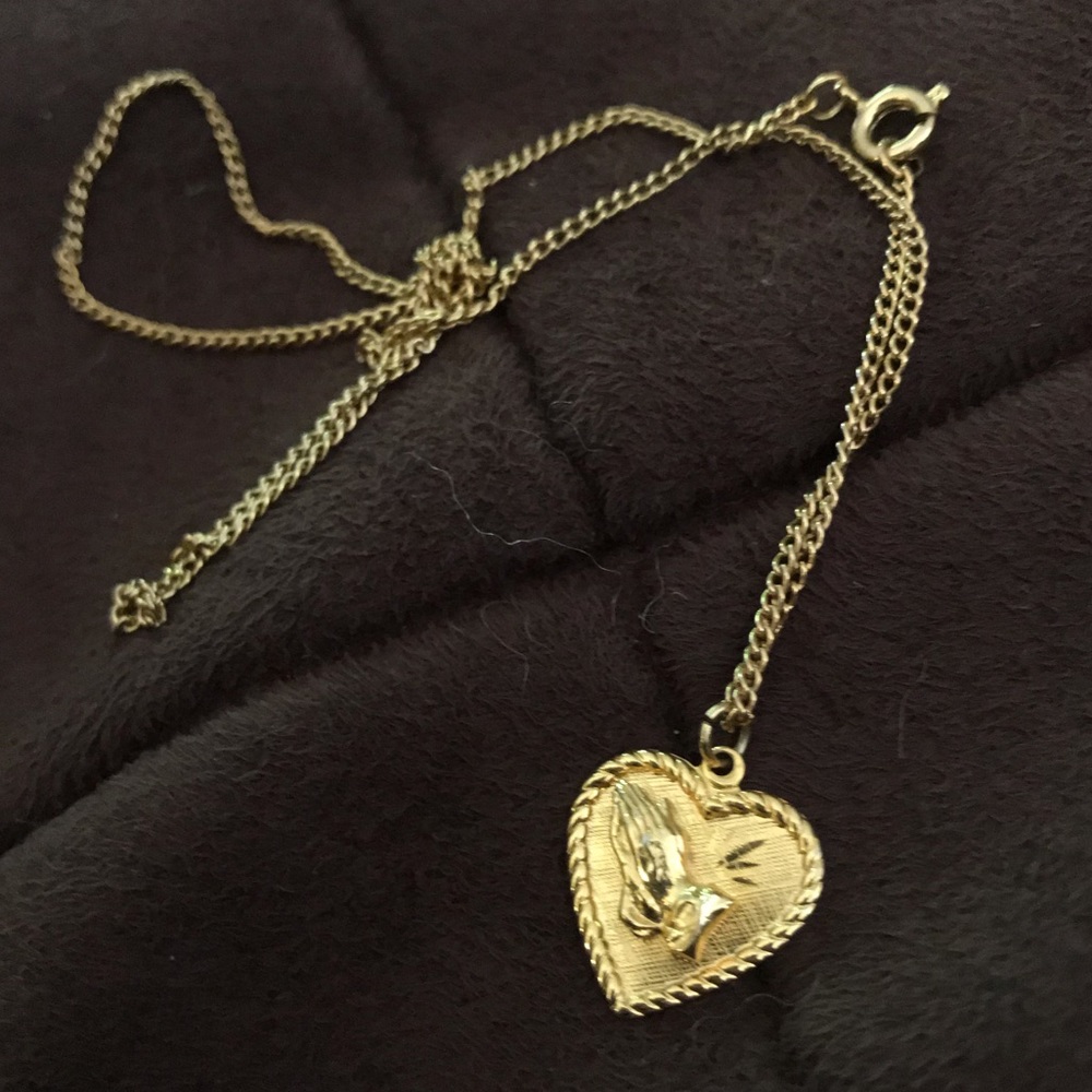 Gorgeous new gold plated hand prayer necklace